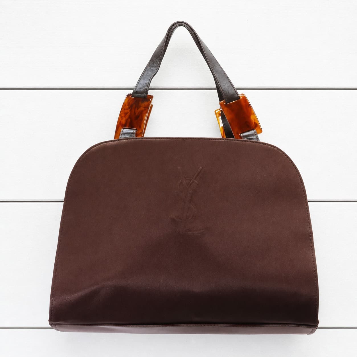 Yves Saint Laurent Brown Canvas Top Handle Handbag Bag Tortoise Lucite Handles handbags auction on bidia.ai