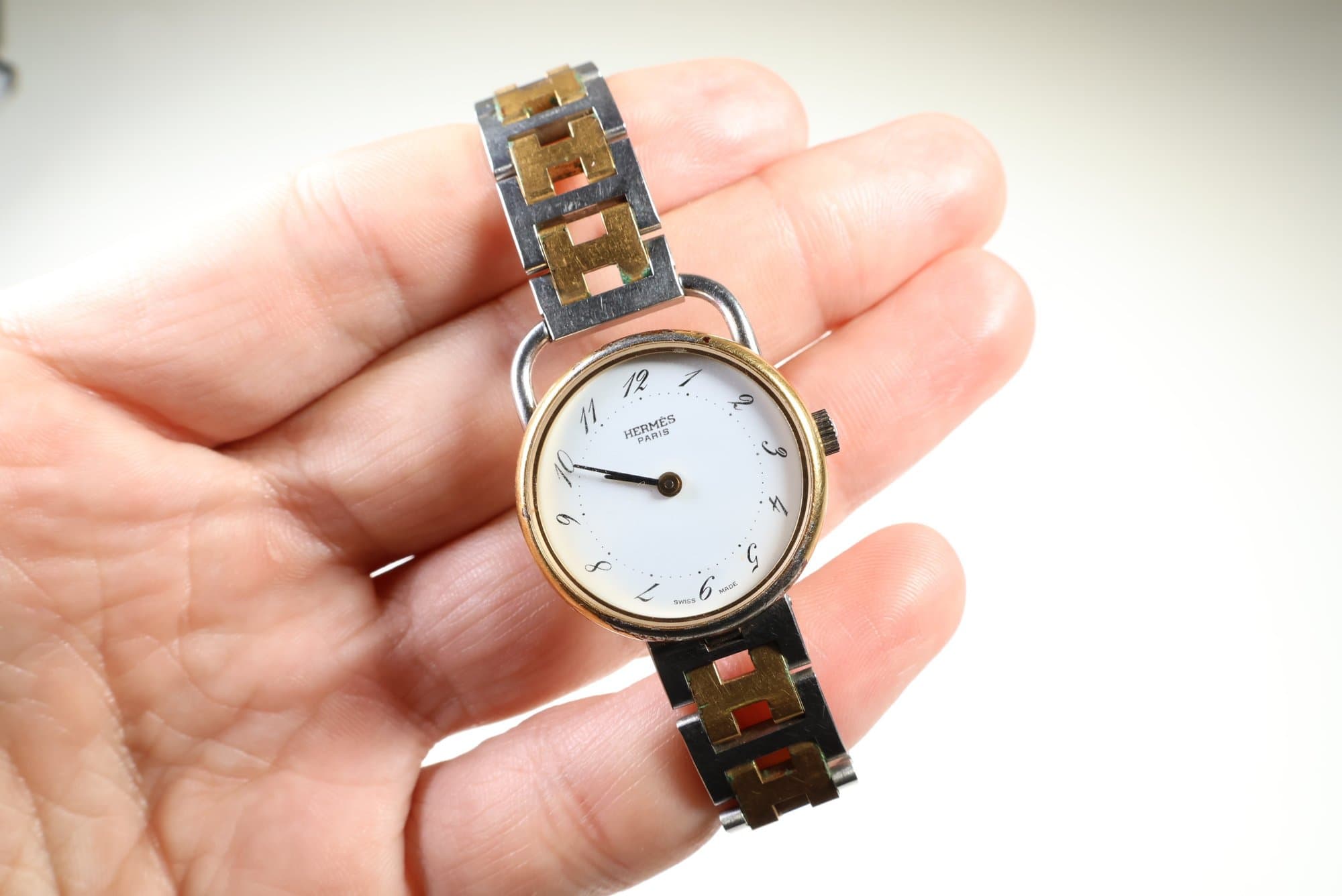 Hermes Arceau Ladies Two-Tone Quartz Watch, Steel And Gold-Tone H-Link Bracelet watches auction on bidia.ai