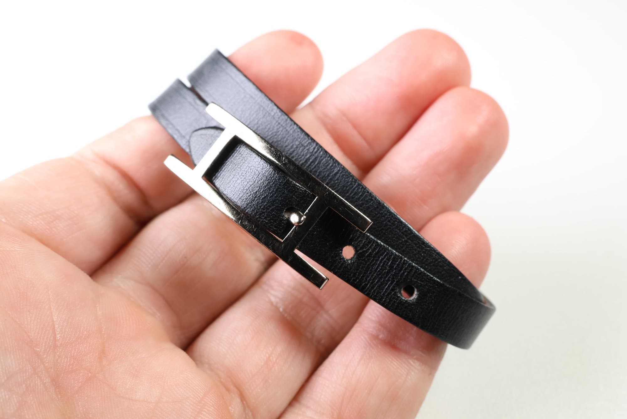 Hermes Behapi Double Tour Reversible Leather Bracelet, Black & Tan, Palladium H Buckle jewelry auction on bidia.ai