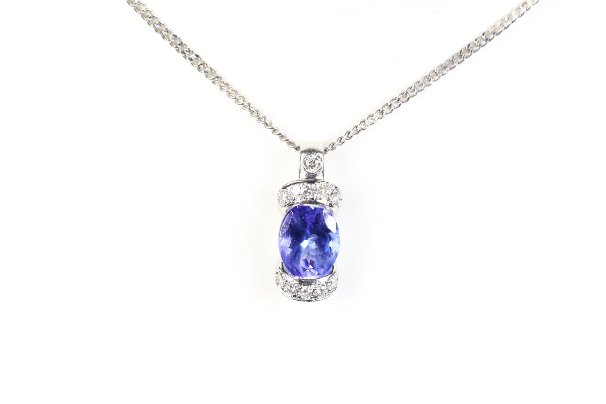 Natural Tanzanite & Diamond Pendant Necklace 2.26ctw, Platinum 6.8 Grams Jewelry Gemstone Diamonds jewelry auction on bidia.ai
