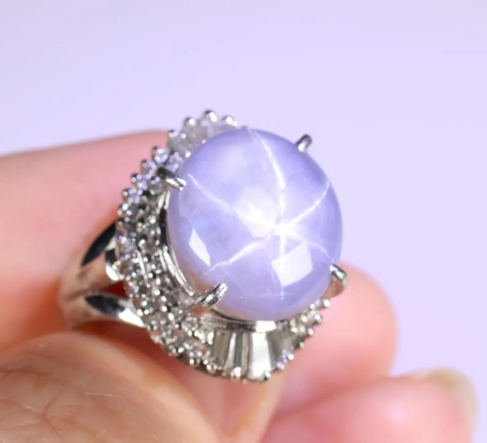 Natural Blue Star Sapphire 14.73ctw & Diamond 0.61ctw Platinum Ring, Size 7 jewelry auction on bidia.ai