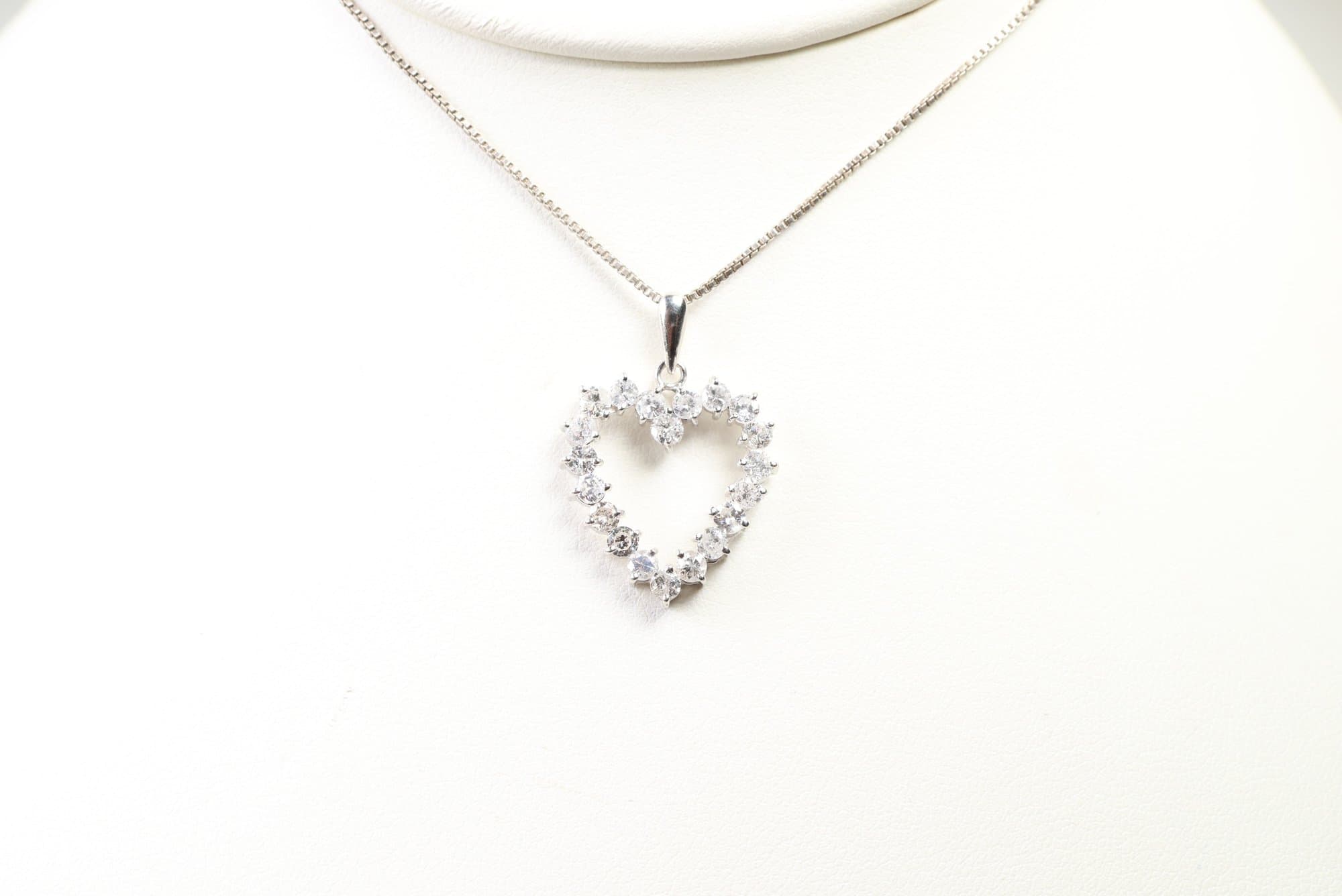 Platinum, Natural Diamond Heart Pendant 1.60ctw. Diamonds Gemstone Jewelry jewelry auction on bidia.ai