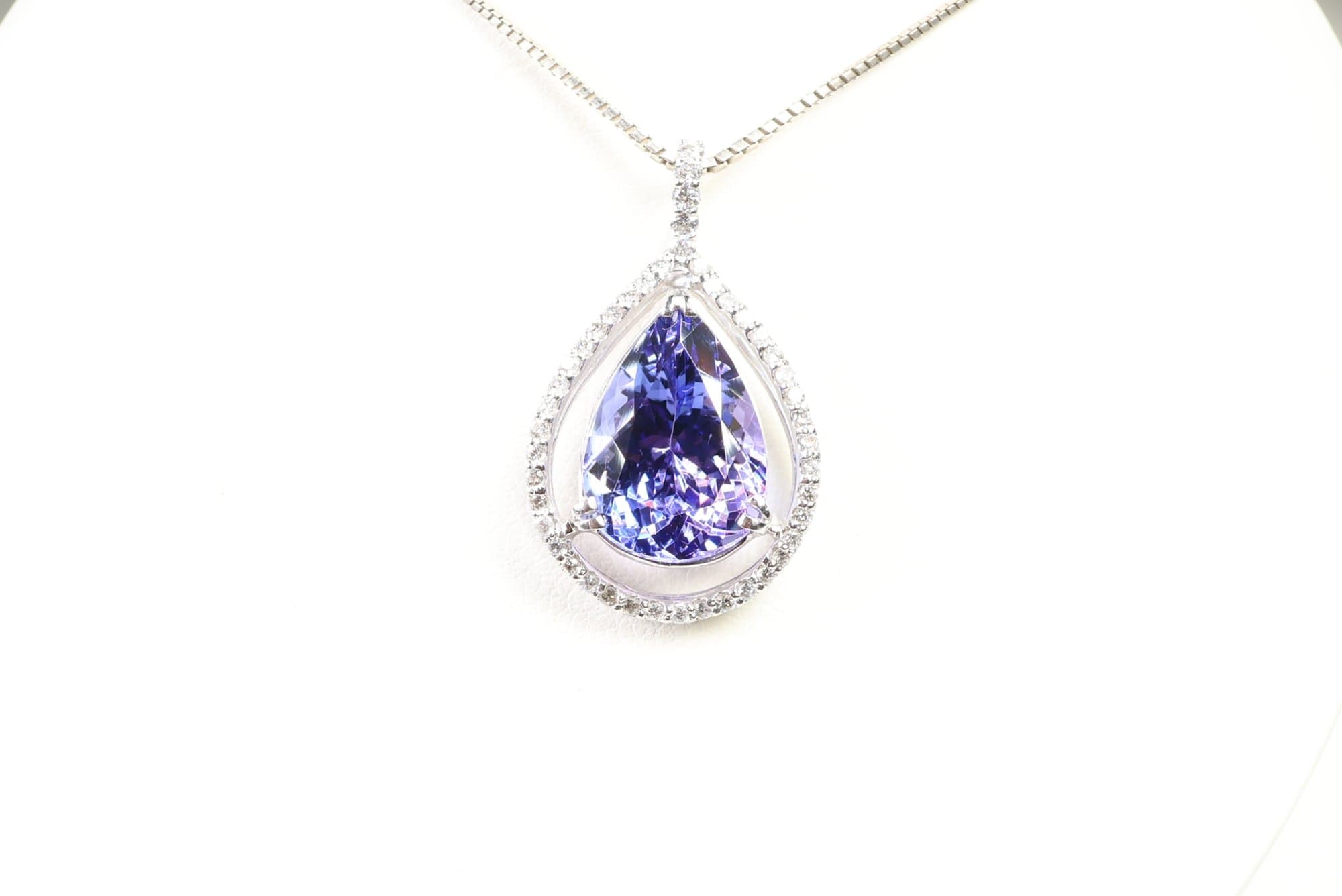 Platinum, Natural Tanzanite & Diamond Pendant 4.19ctw, Gemstone Jewelry Diamonds jewelry auction on bidia.ai