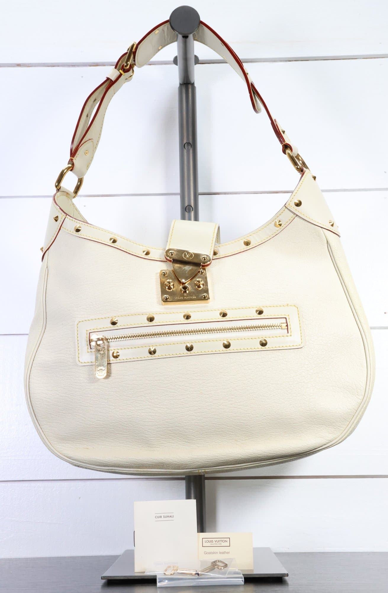 Louis Vuitton Suhali L'Affriolant Bag White Goat Leather Chevre Gold Stud Details handbags auction on bidia.ai