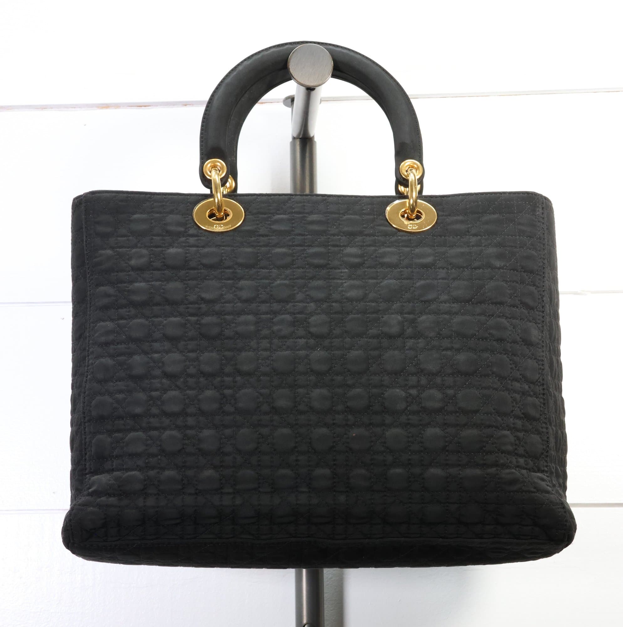 Christian Dior Black Quilted Nylon Lady Dior Handbag Gold Hardware Red Lining Purse handbags auction on bidia.ai