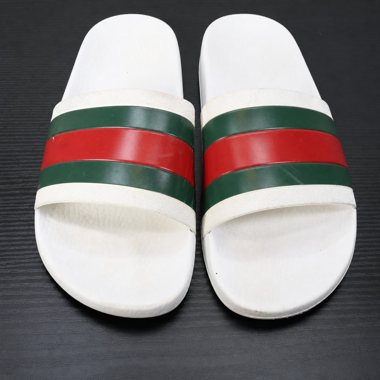 Gucci Pursuit White Rubber Slide Sandal Green Red Web Stripe Slippers fashion auction on bidia.ai