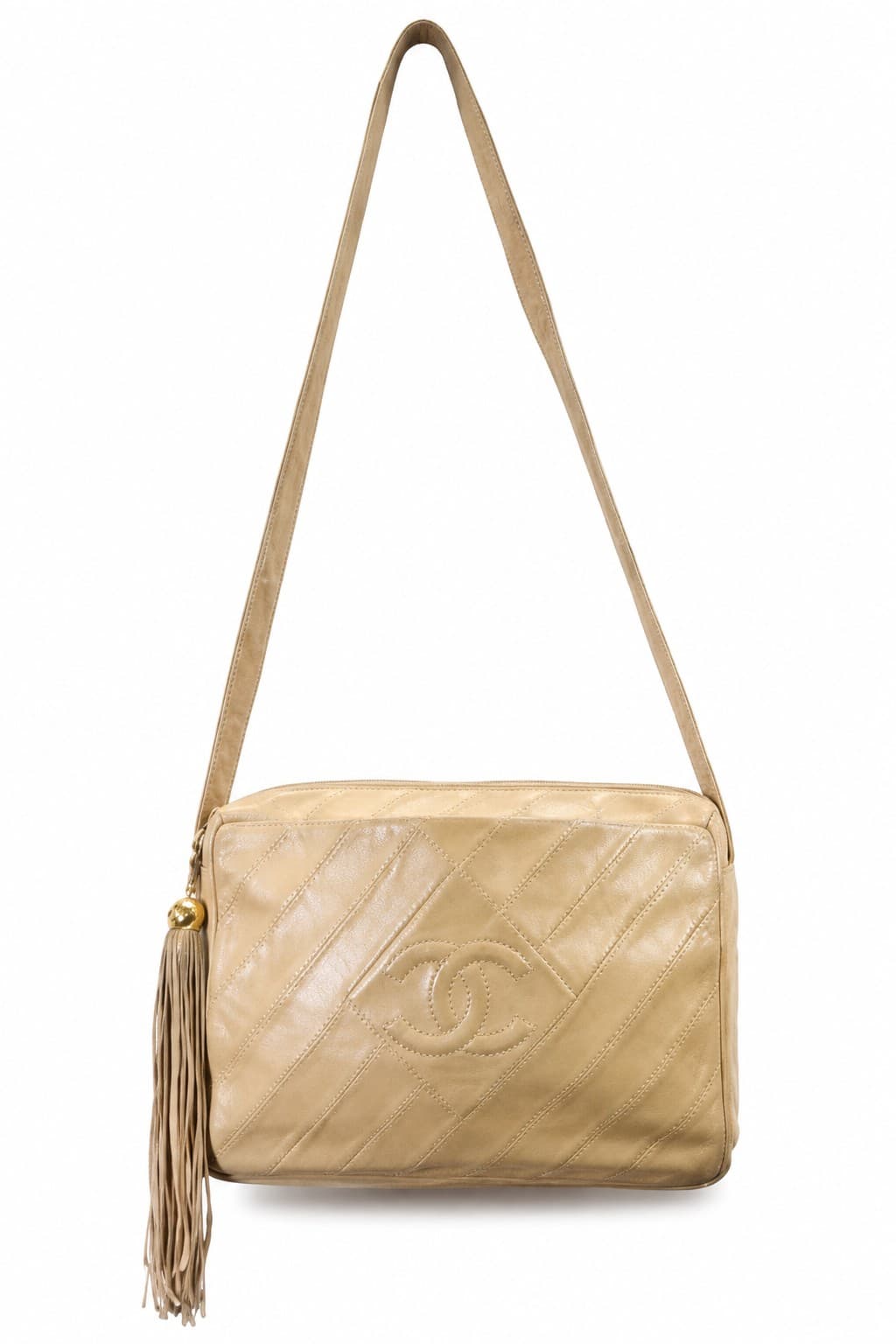 Chanel Interlocking C Beige Lambskin Diagonal Stitch CC Tassel Purse Crossbody Bag handbags auction on bidia.ai