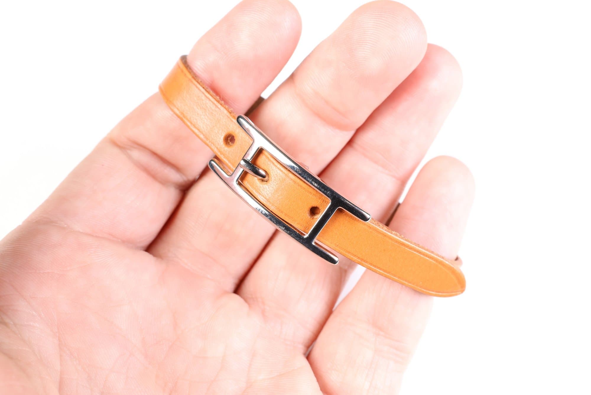 HERMES Belt Buckle Bracelet Palladium Hardware & Brown Leather Authentic Jewelry & Watches auction on bidia.ai